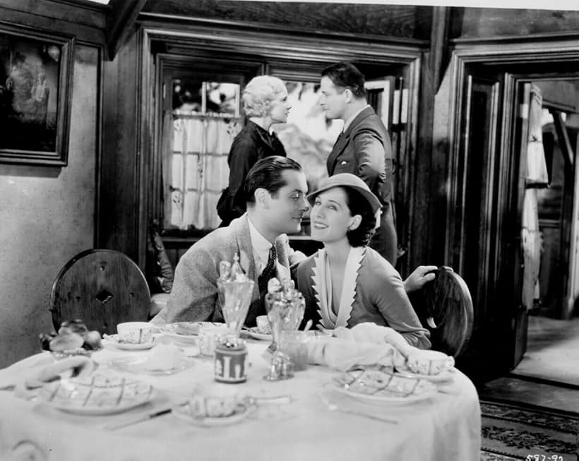 Reginald Denny, Una Merkel, Robert Montgomery, and Norma Shearer in Private Lives (1931)