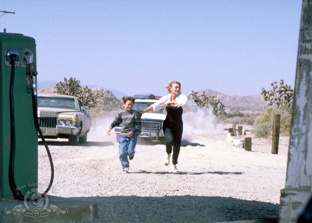 Robbie Thibaut Jr. and Kylie Travis in Retroactive (1997)