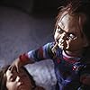 Brad Dourif and Alex Vincent in Child's Play (1988)