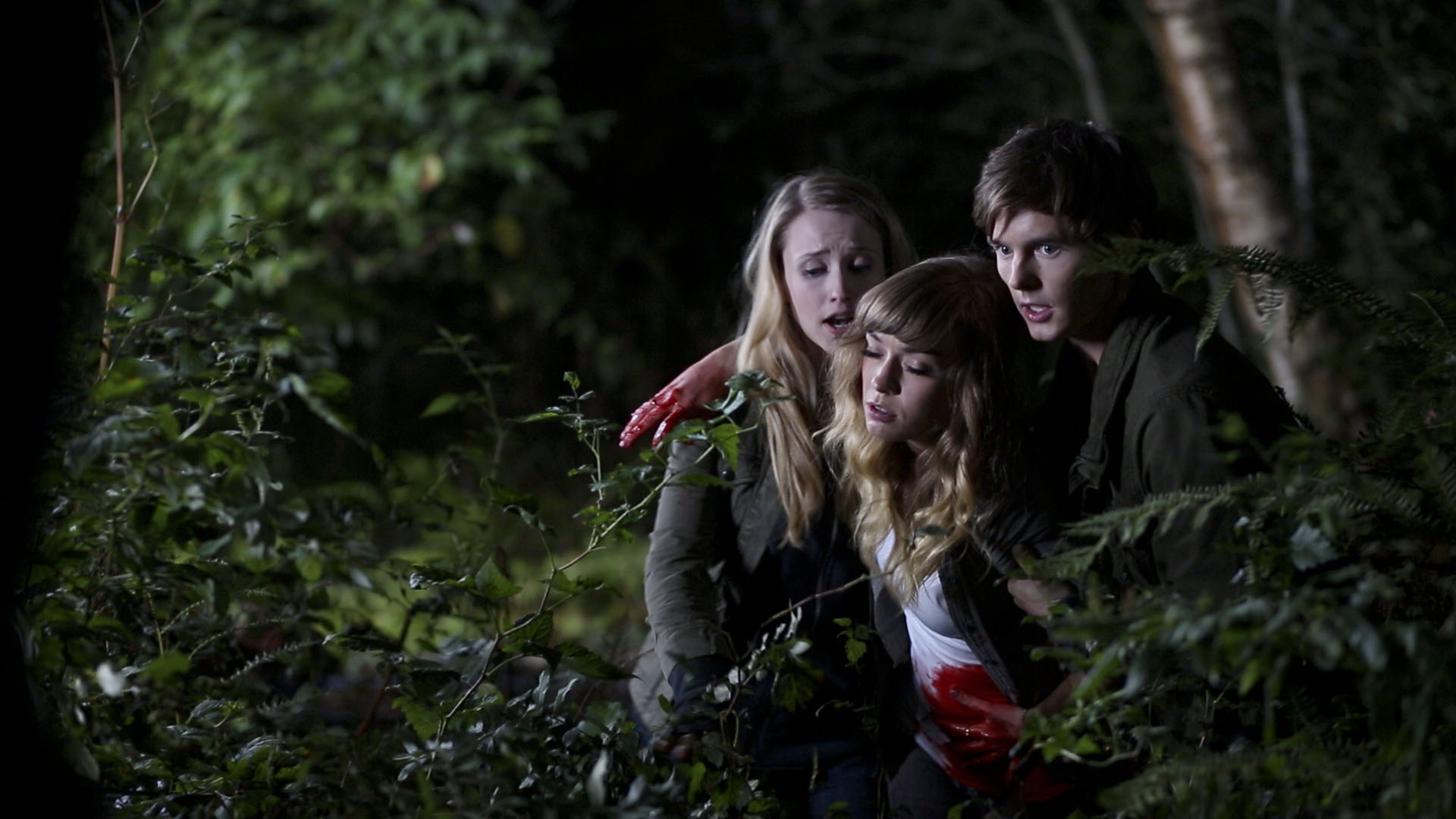 Britt Irvin, Emily Tennant, and Tyler Johnston in Feed the Gods (2014)