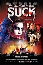 Malcolm McDowell, Alice Cooper, Dave Foley, Moby, Iggy Pop, Alex Lifeson, Jessica Paré, Henry Rollins, Rob Stefaniuk, Mike Lobel, Paul Anthony, Dimitri Coats, and Chris Ratz in Suck (2009)