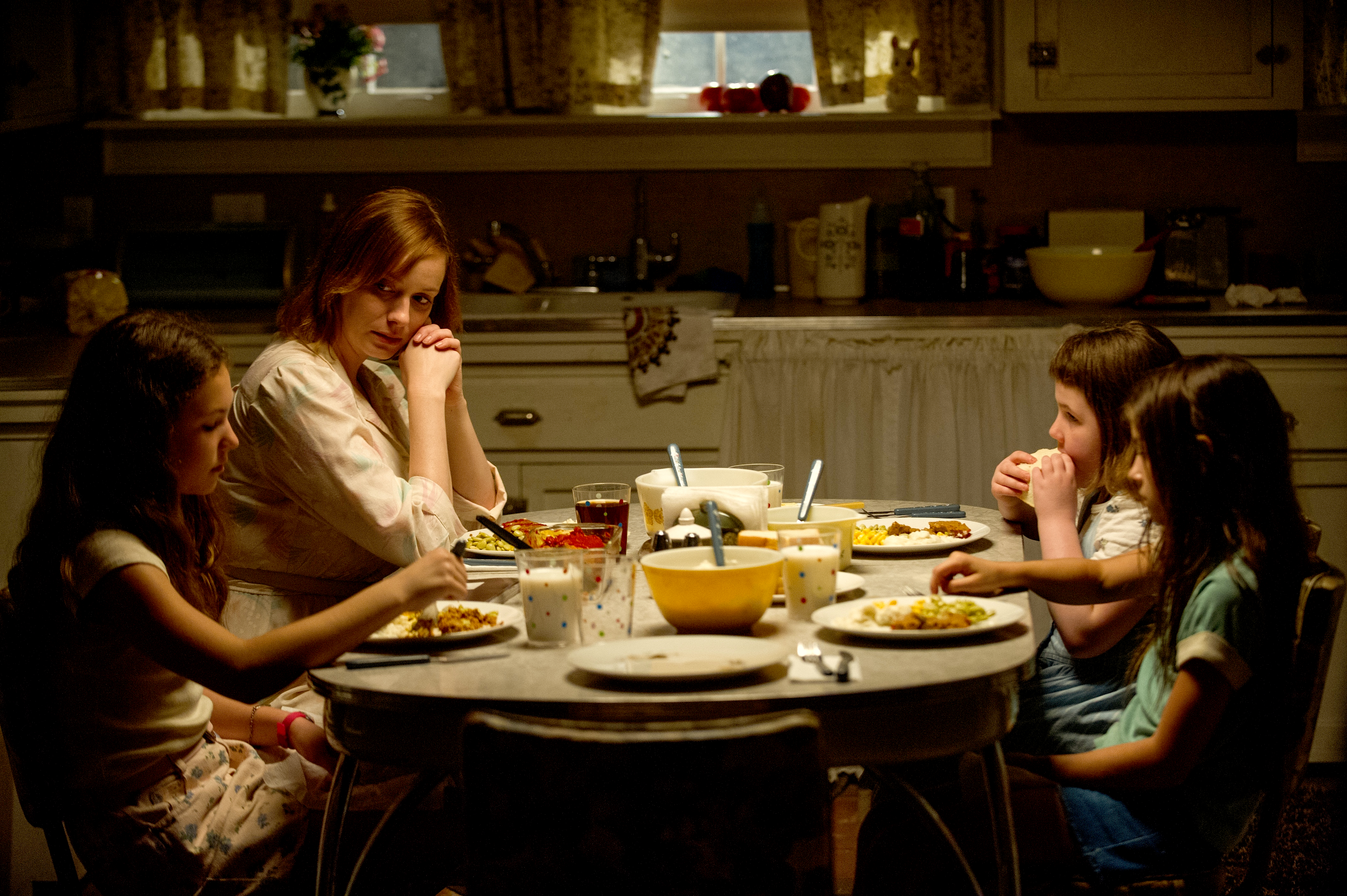 Christina Hendricks, Sterling Jerins, Natalie Precht, and Madison McGuire in Dark Places (2015)