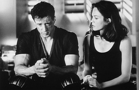 Diane Lane and Sylvester Stallone in Judge Dredd (1995)