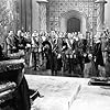 Errol Flynn, Donald Crisp, Ralph Forbes, Henry Stephenson, James Stephenson, Robert Warwick, and Henry Daniel in The Private Lives of Elizabeth and Essex (1939)