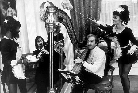 "Magic Christian, The" Ringo Starr plays the flute while Peter Sellar dabbles with the harp. 1969 Commonwealth United / MPTV