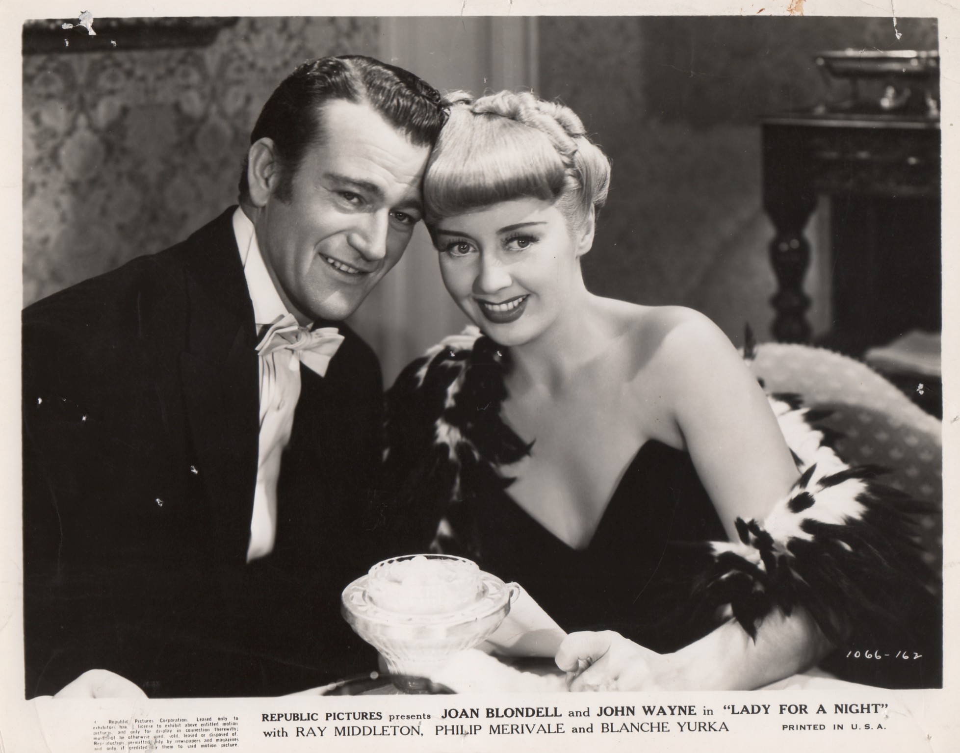 John Wayne and Joan Blondell in Lady for a Night (1942)