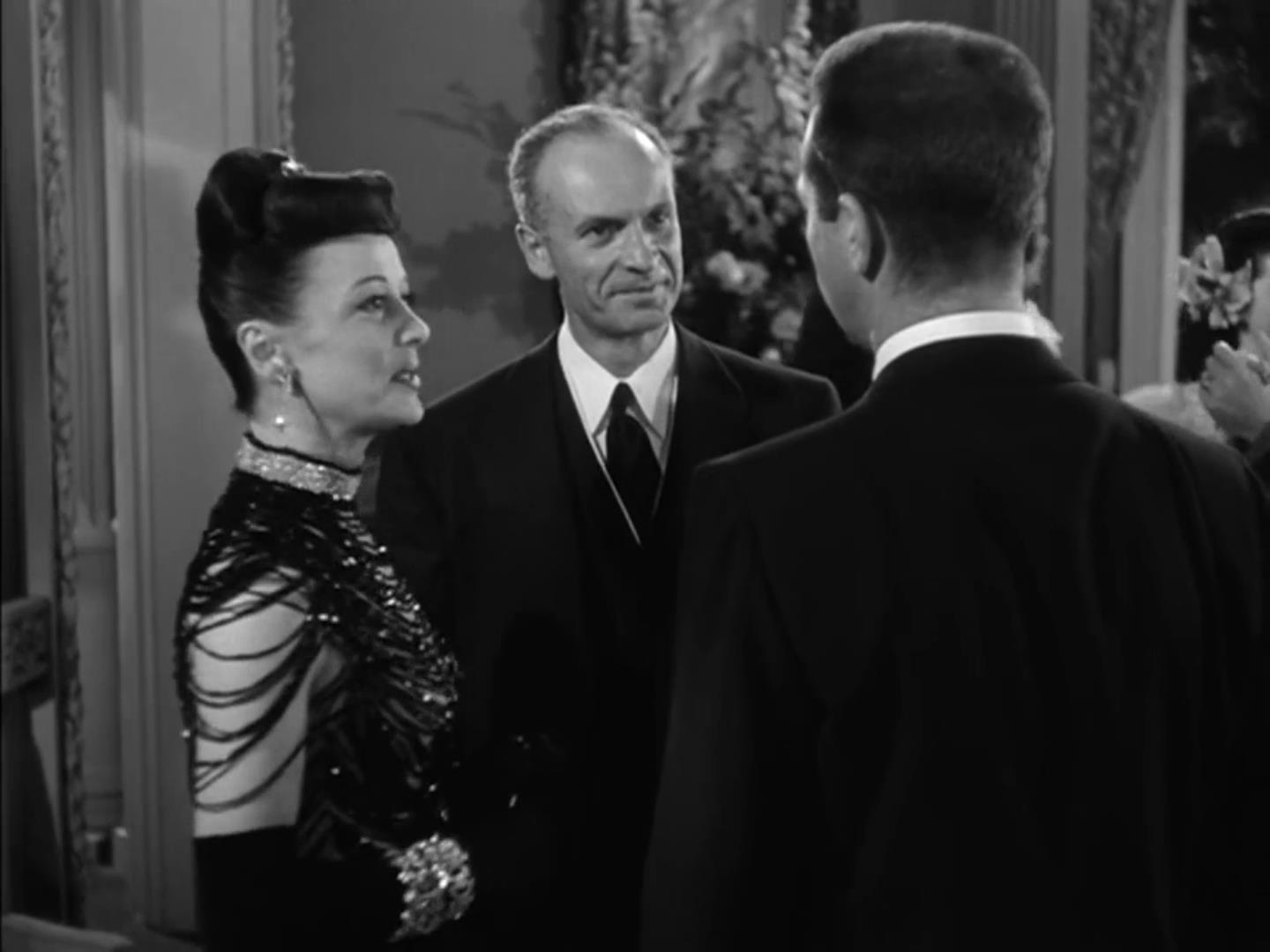 Gregory Gaye and Nina Vale in Cornered (1945)