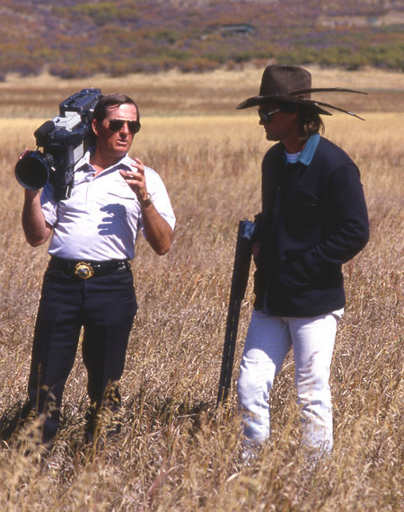 Director of Photography, Larry Lindsey, with actor Kurt Russell on a shoot for ESPN. (1984)