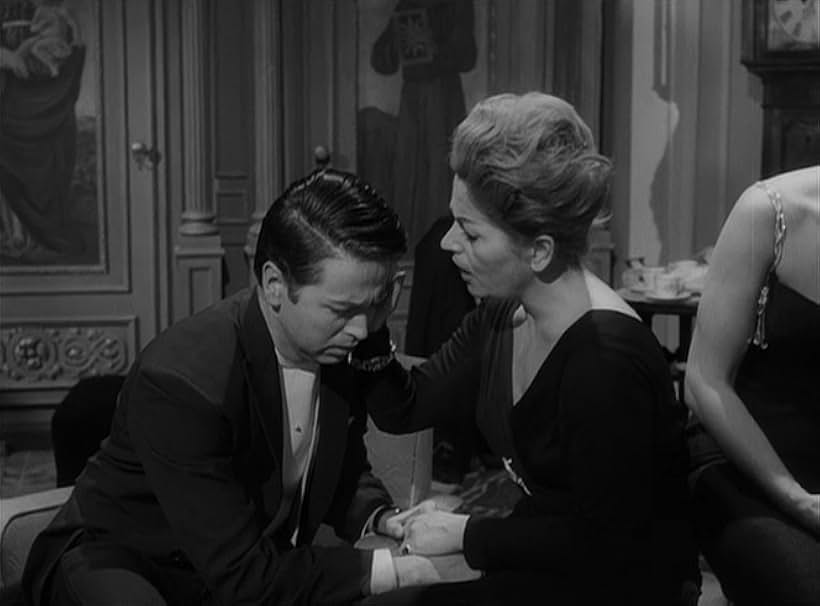 Ofelia Guilmáin and Xavier Loyá in The Exterminating Angel (1962)