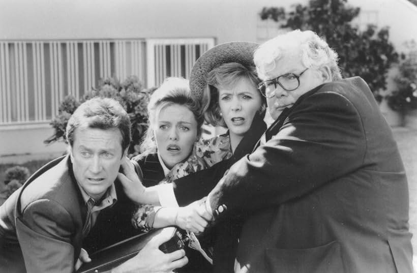 Patsy Kensit, Bryan Brown, Richard Griffiths, and Alison Steadman in Blame It on the Bellboy (1992)