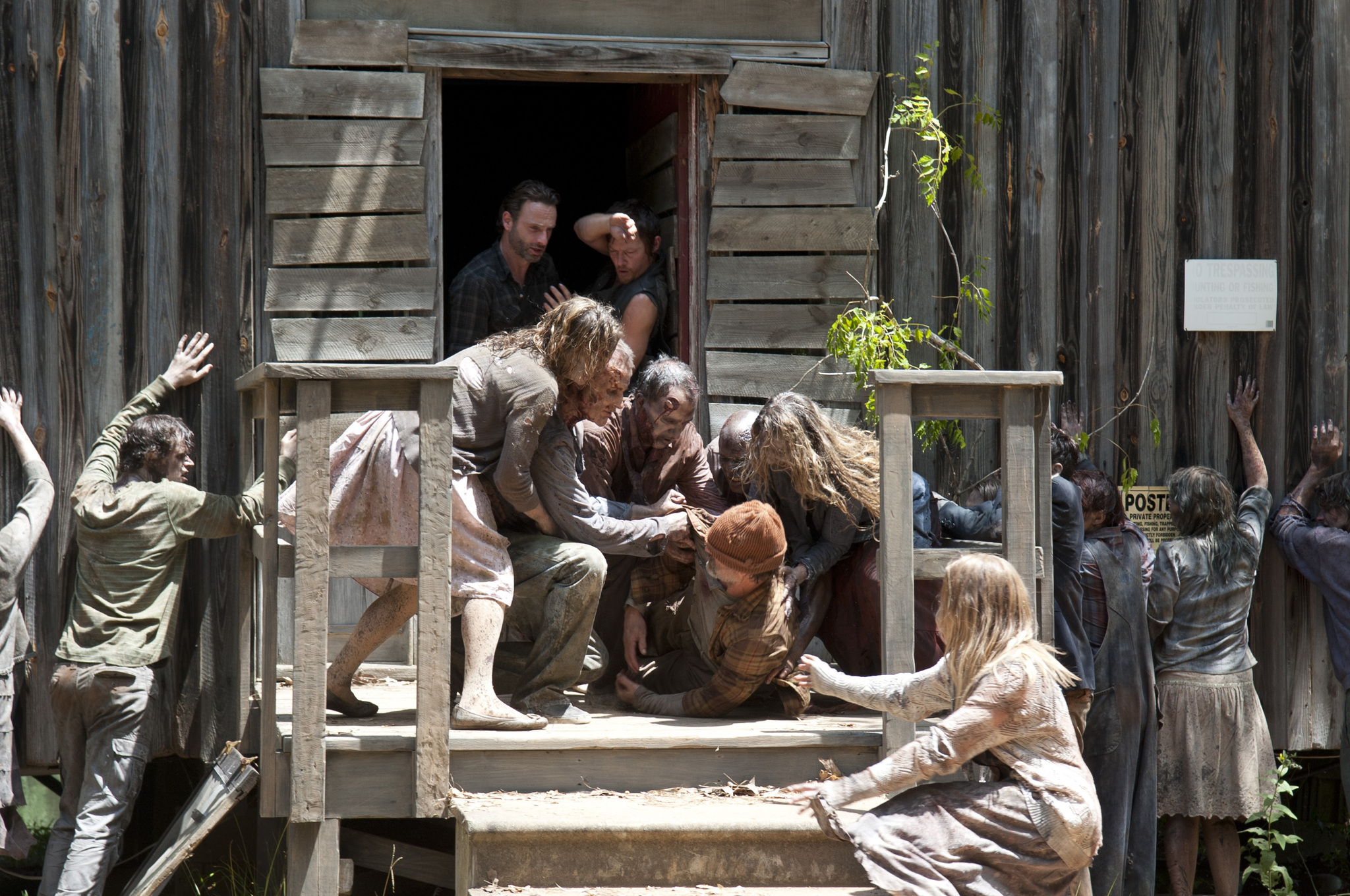 Norman Reedus, Andrew Lincoln, Alex Van, and Michelle Flanagan-Helmeczy in The Walking Dead (2010)