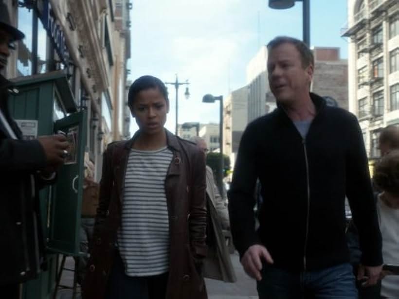 Kiefer Sutherland and Gugu Mbatha-Raw in Touch (2012)