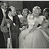 Albert Conti, Charles Judels, Evelyn Laye, and Una Merkel in The Night Is Young (1935)