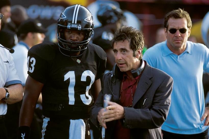 Tony, Willie and Cap on the sidelines