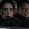 Kevin Chapman and Sarah Shahi in Person of Interest (2011)