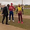 Jos Buttler, Samuel Badree, Rovman Powell, and Richie Richardson in West Indies vs England, CG United 4th T20 International (2023)