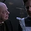 Wallace Shawn and Dina Spybey-Waters in The Haunted Mansion (2003)