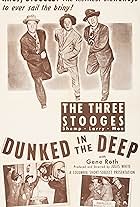 Moe Howard, Larry Fine, Shemp Howard, and Gene Roth in Dunked in the Deep (1949)