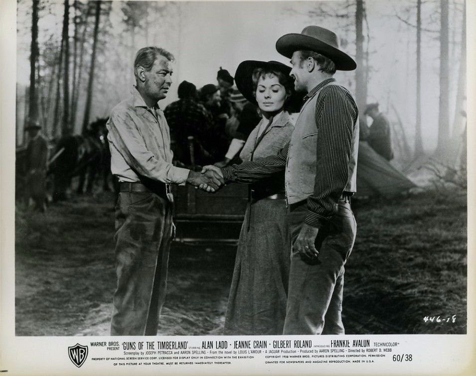 Alan Ladd, Jeanne Crain, and Lyle Bettger in Guns of the Timberland (1960)