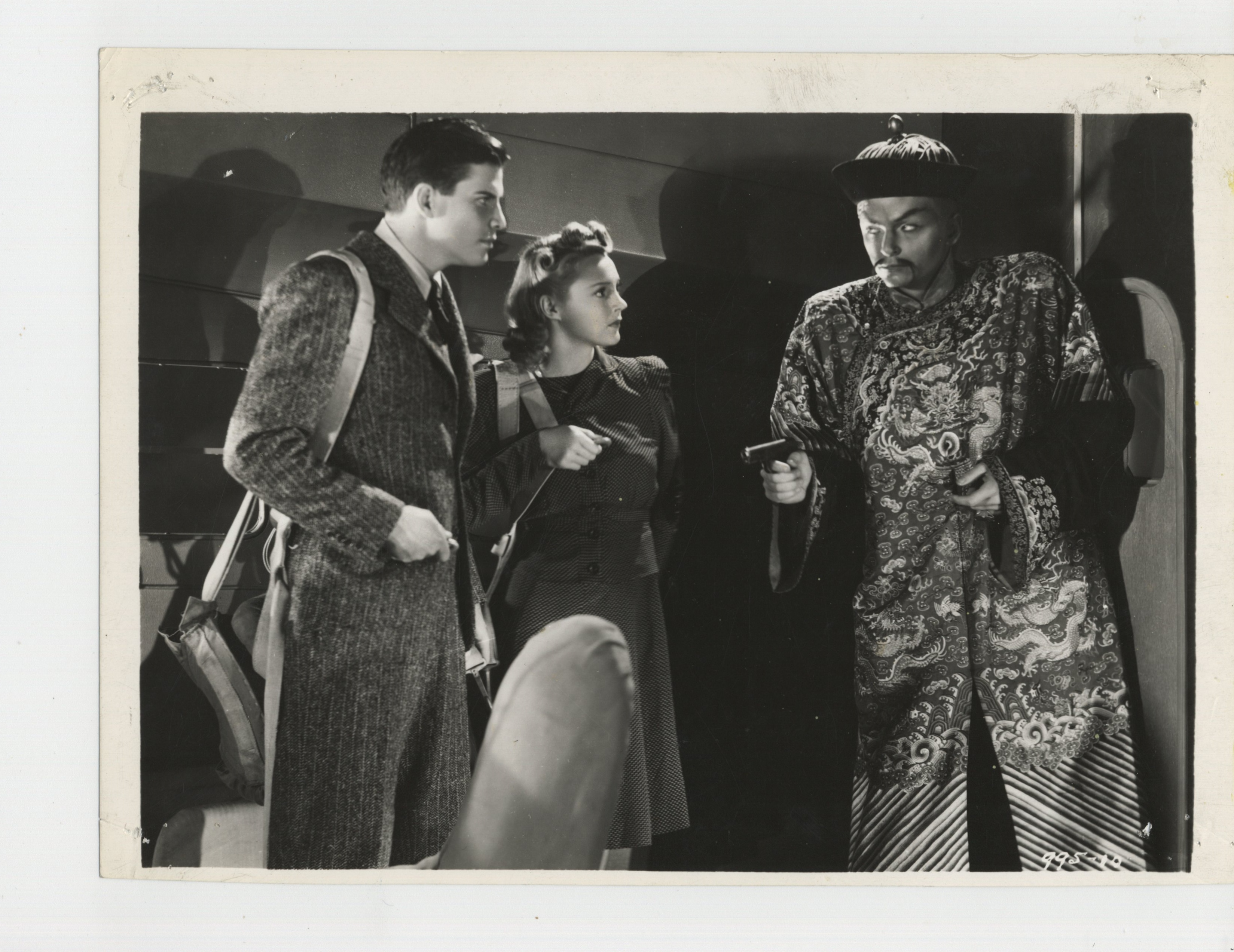 Henry Brandon, Robert Kellard, and Luana Walters in Drums of Fu Manchu (1943)