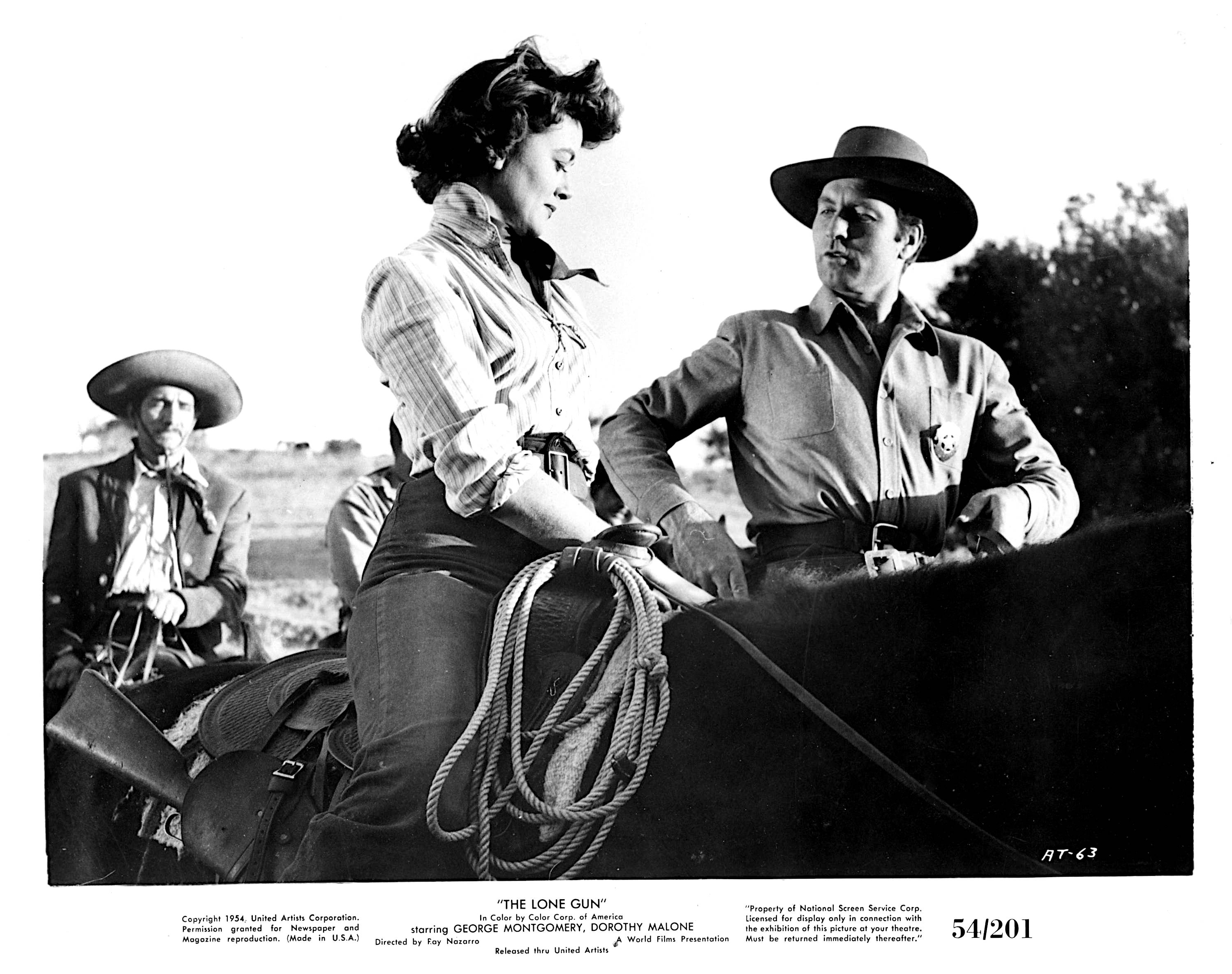 Dorothy Malone and George Montgomery in The Lone Gun (1954)