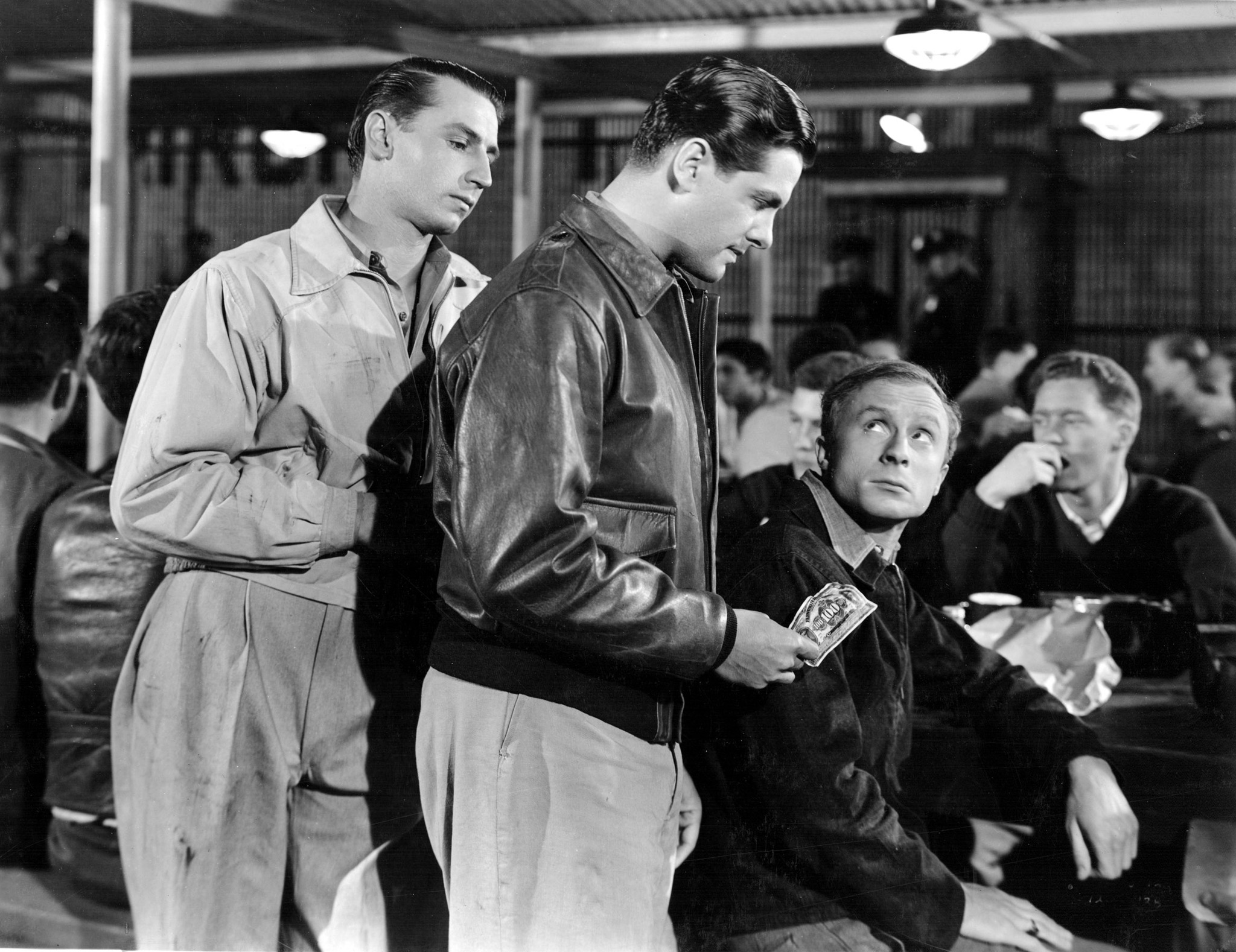 Robert Cummings, Norman Lloyd, and Virgil Summers in Saboteur (1942)