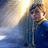 Tom Hanks, Daryl Sabara, and Josh Hutcherson in The Polar Express (2004)