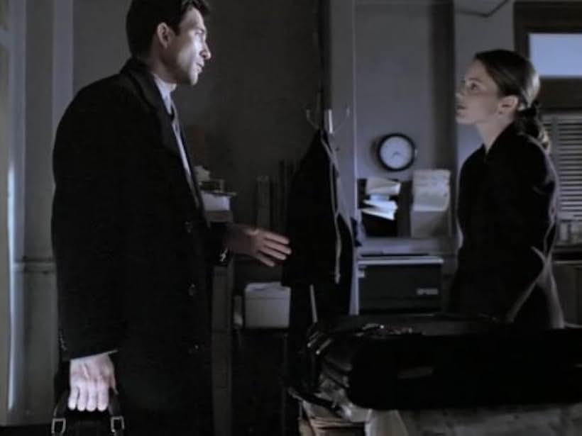 Dylan McDermott and Kelli Williams in The Practice (1997)