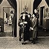 Charles Chaplin, Laura Anson, Gladys Baxter, Harry Maynard, and Edna Purviance in The Idle Class (1921)