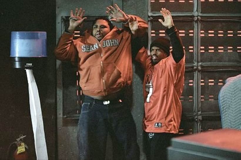 Anthony Anderson and Lahmard J. Tate in Barbershop (2002)