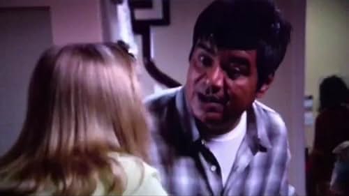 George Lopez and Deb Podowski in the movie Mr.Troop Mom