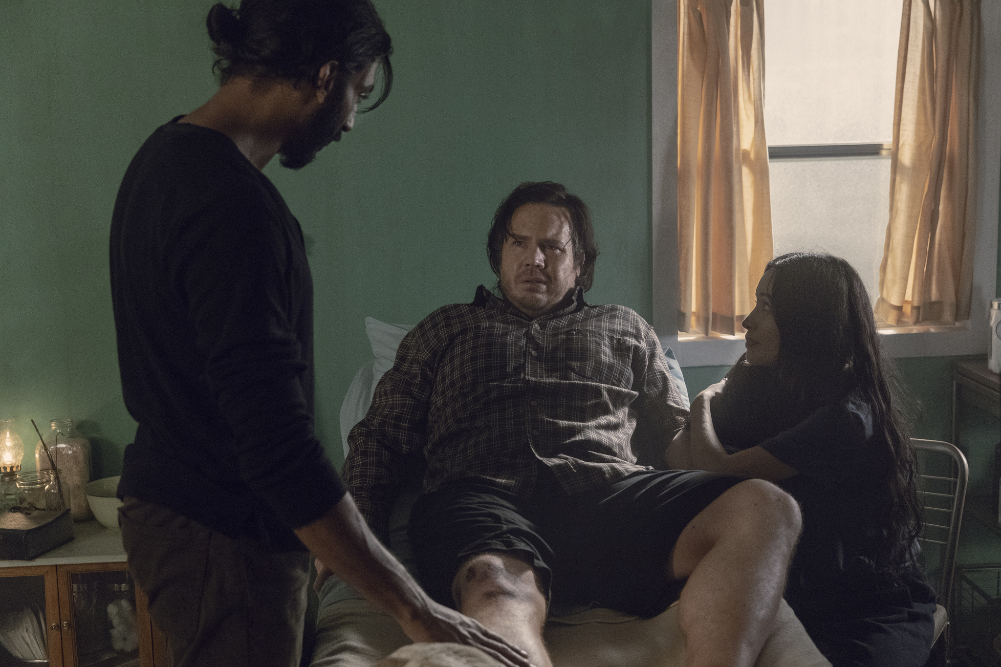 Christian Serratos, Josh McDermitt, and Avi Nash in The Walking Dead (2010)