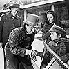 Agnes Moorehead, George Coulouris, Harry Shannon, and Buddy Swan in Citizen Kane (1941)