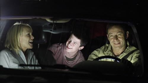 Jason Isaacs, Laura Allen, and Dylan Minnette in Awake (2012)