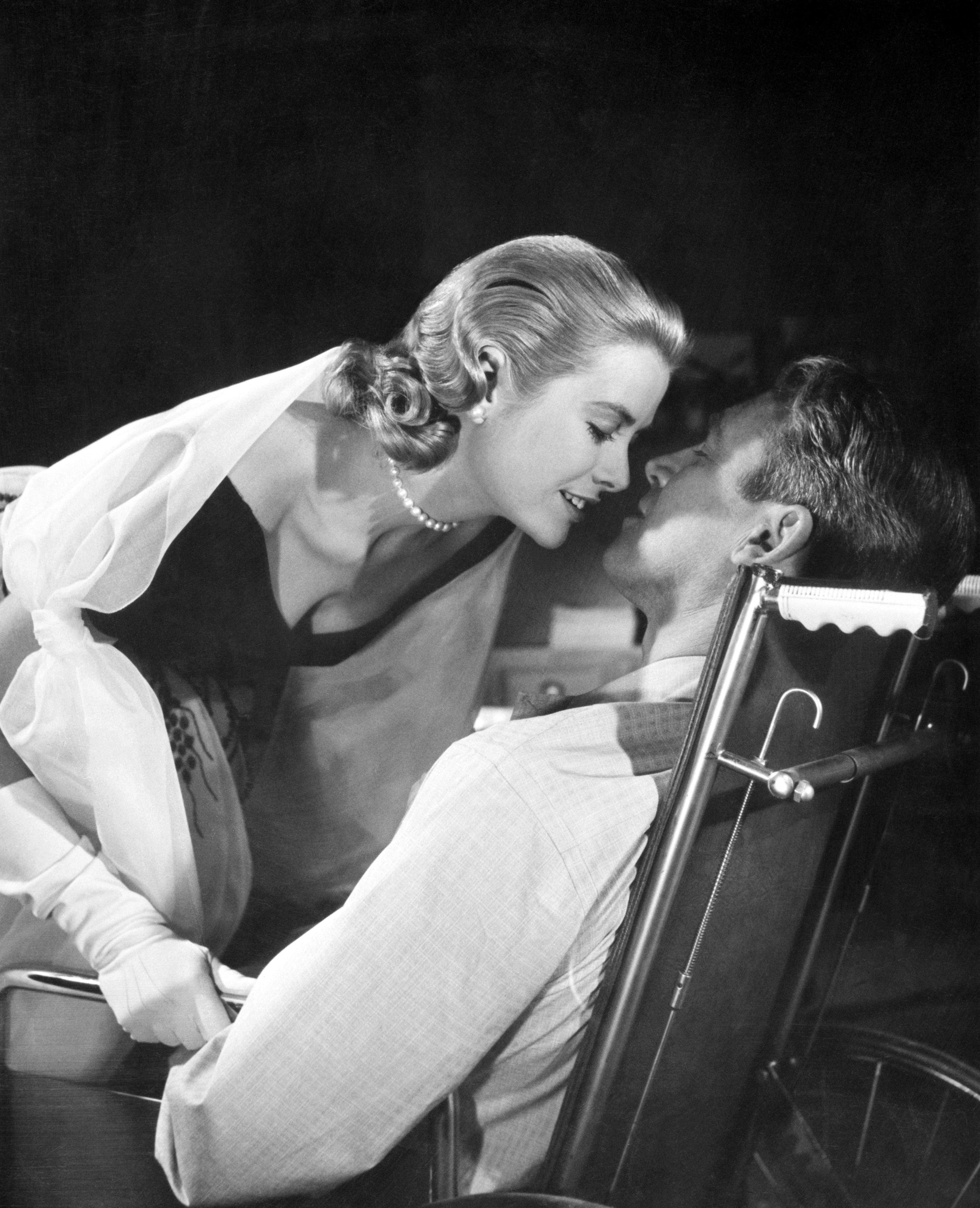 Grace Kelly and James Stewart in Rear Window (1954)