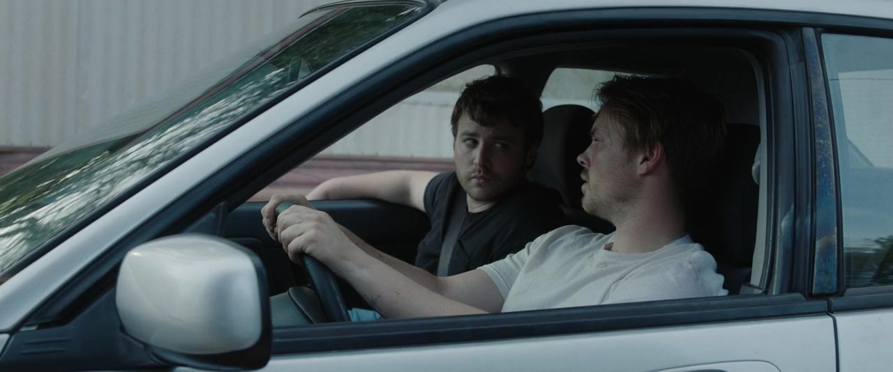 Emory Cohen and Sam Strike in American Outlaws (2023)