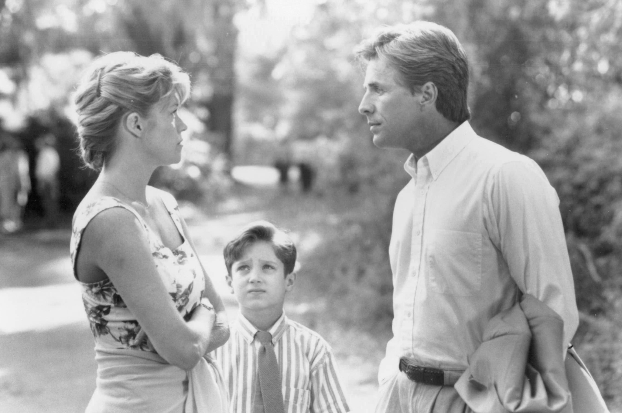 Melanie Griffith, Don Johnson, and Elijah Wood in Paradise (1991)