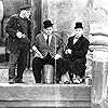 Oliver Hardy, Stan Laurel, and Walter Long in The Live Ghost (1934)