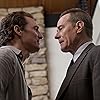 Matthew McConaughey and Bryan Cranston in The Lincoln Lawyer (2011)