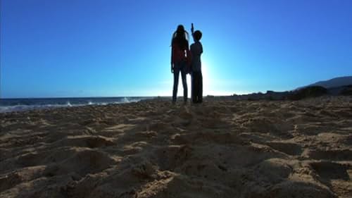 At the beach, a young girl braves the taunts of her brother while waiting for a call. Only she can offer what the Caller needs. But will he reach her in time?