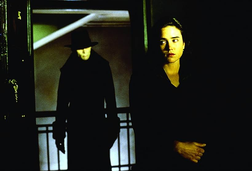 Jennifer Connelly and Richard O'Brien in Dark City (1998)