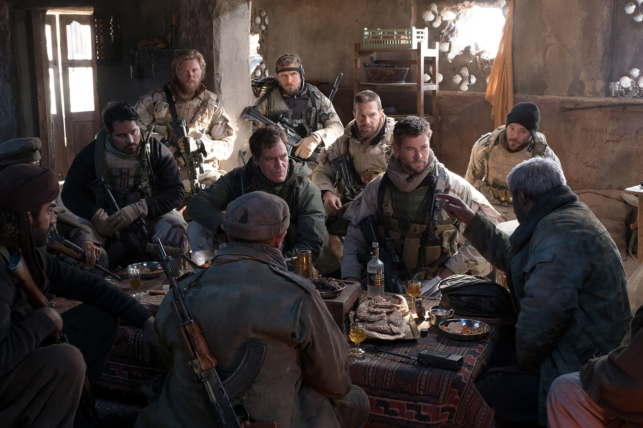 Thad Luckinbill, Michael Peña, Michael Shannon, Geoff Stults, Navid Negahban, Chris Hemsworth, Fahim Fazli, Austin Hébert, and Jack Kesy in 12 Strong (2018)