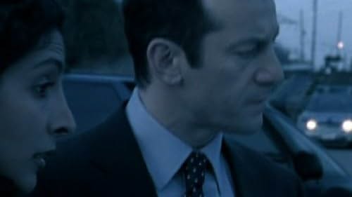 Jason Isaacs and Rahnuma Panthaky in The State Within (2006)