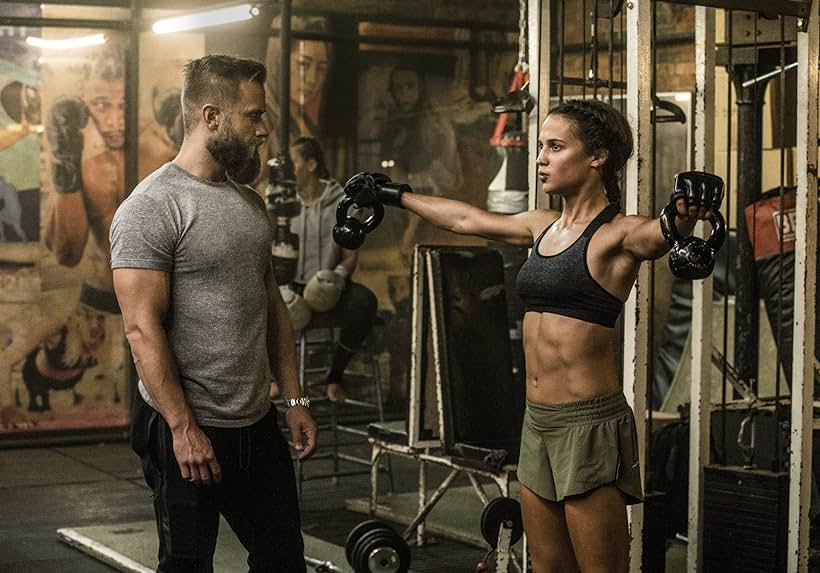 Alicia Vikander and Magnus Lygdback in Tomb Raider (2018)