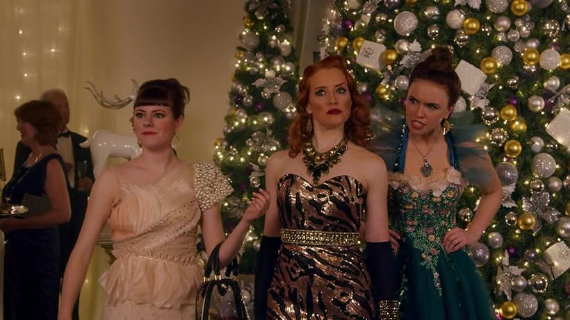 Johannah Newmarch, Chanelle Harquail-Ivsak, and Lillian Doucet-Roche in A Cinderella Story: Christmas Wish (2019)