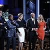 Mark Cuban, Daymond John, Barbara Corcoran, Robert Herjavec, Kevin O'Leary, and Lori Greiner in Shark Tank (2009)