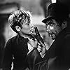 John Howard Davies and Robert Newton in Oliver Twist (1948)