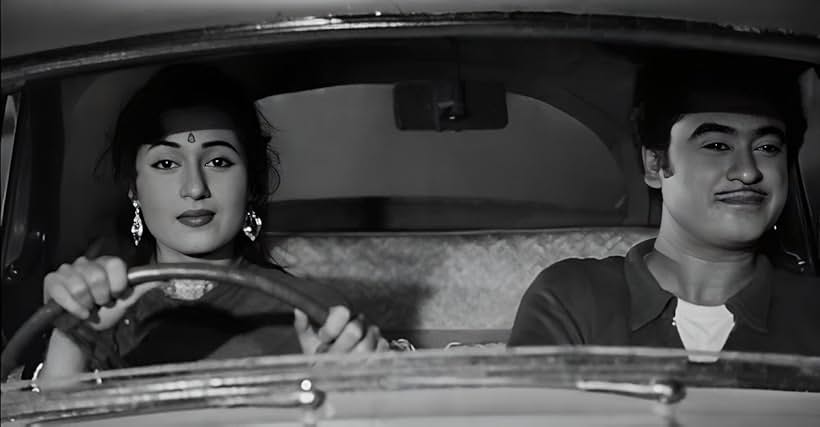 Kishore Kumar and Madhubala in Chalti Ka Naam Gaadi (1958)