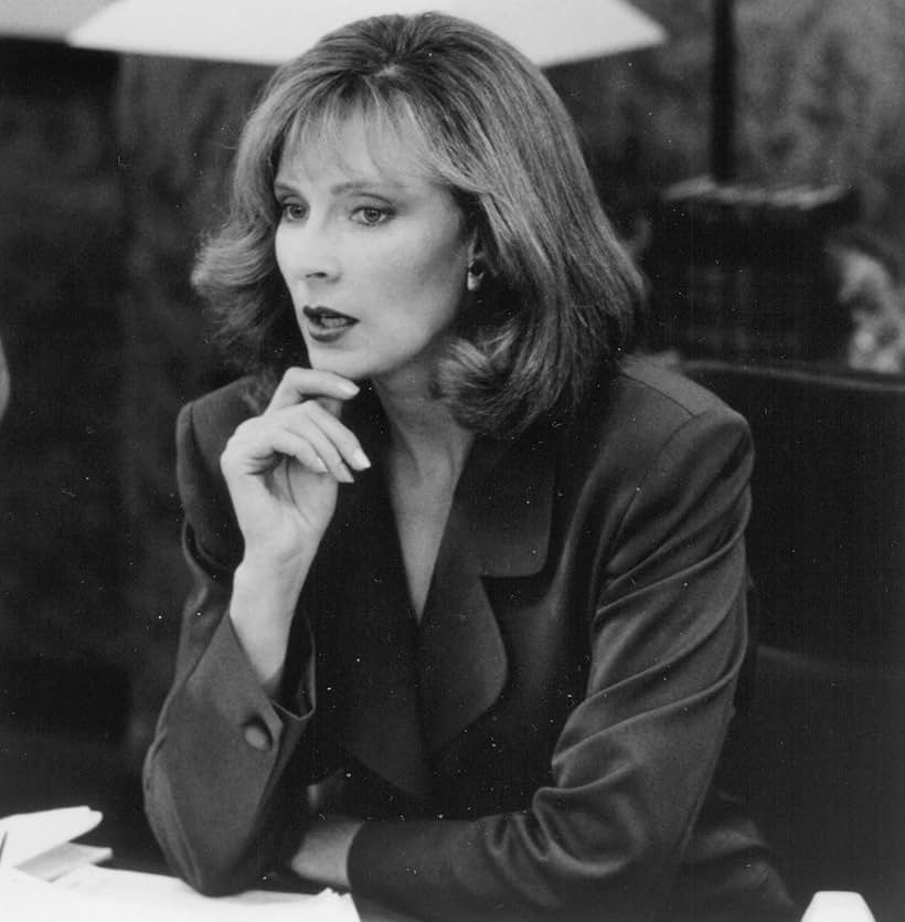 Gates McFadden in Taking Care of Business (1990)