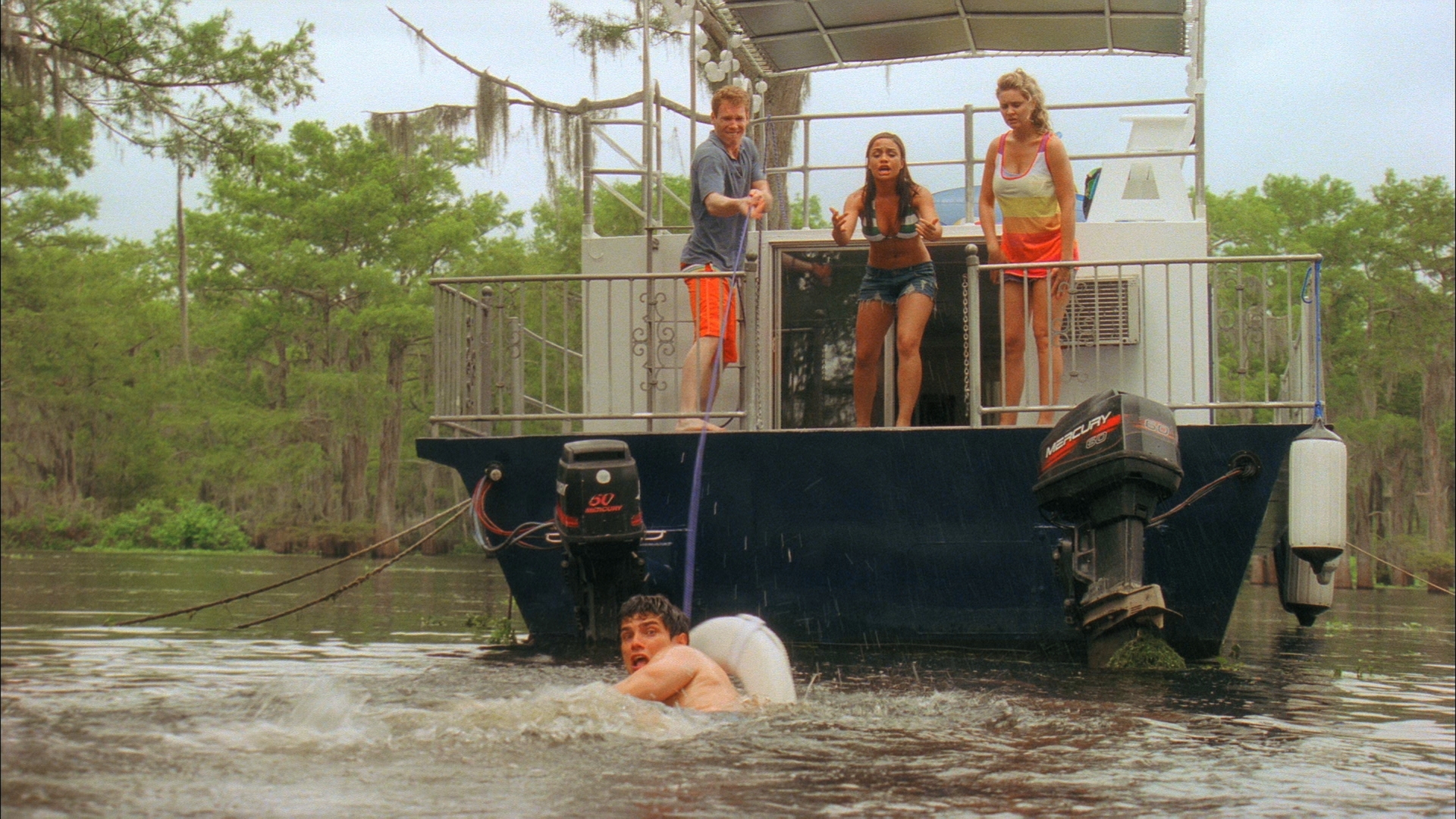 Charles Harrelson, Natacha Itzel Badar, and Sophie Sinise in Swamp Shark (2011)